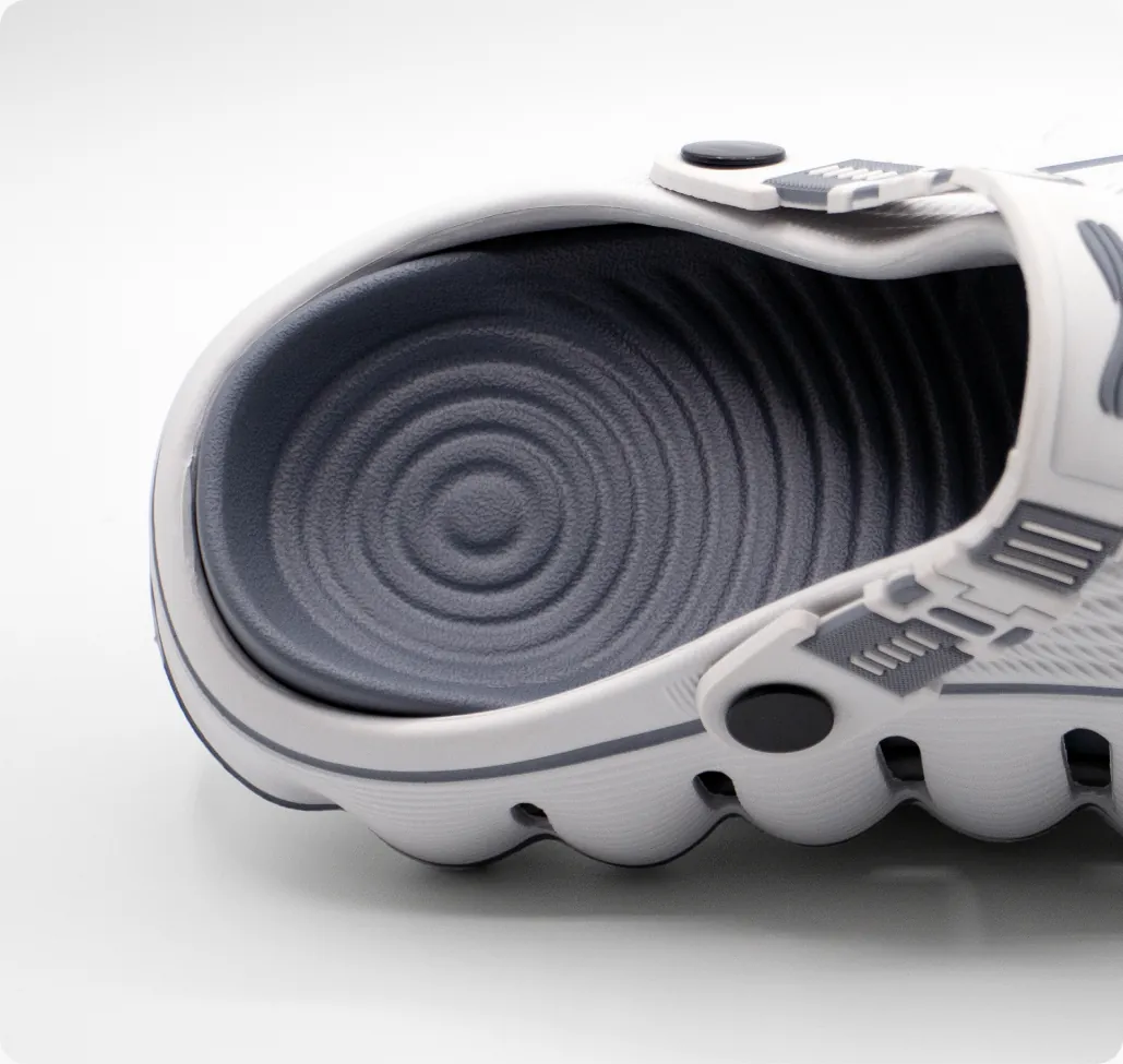 Textured massage footbed inside RESTORE Clogs